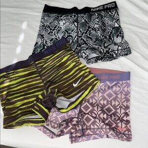 Nike Pro Women's Shorts Trio - Black, Green, Purple